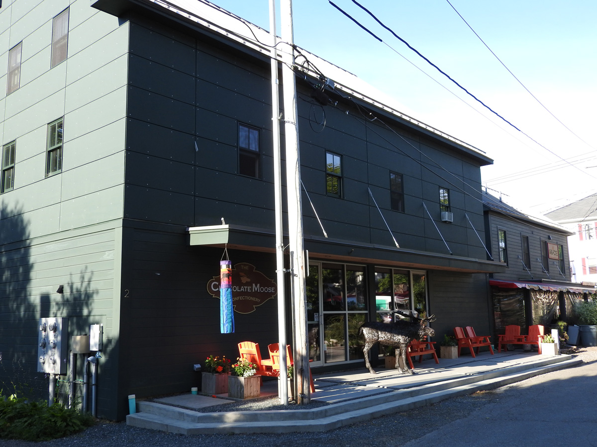 Built commercial property with restaurant, retail store, and 3 apartments upstairs.